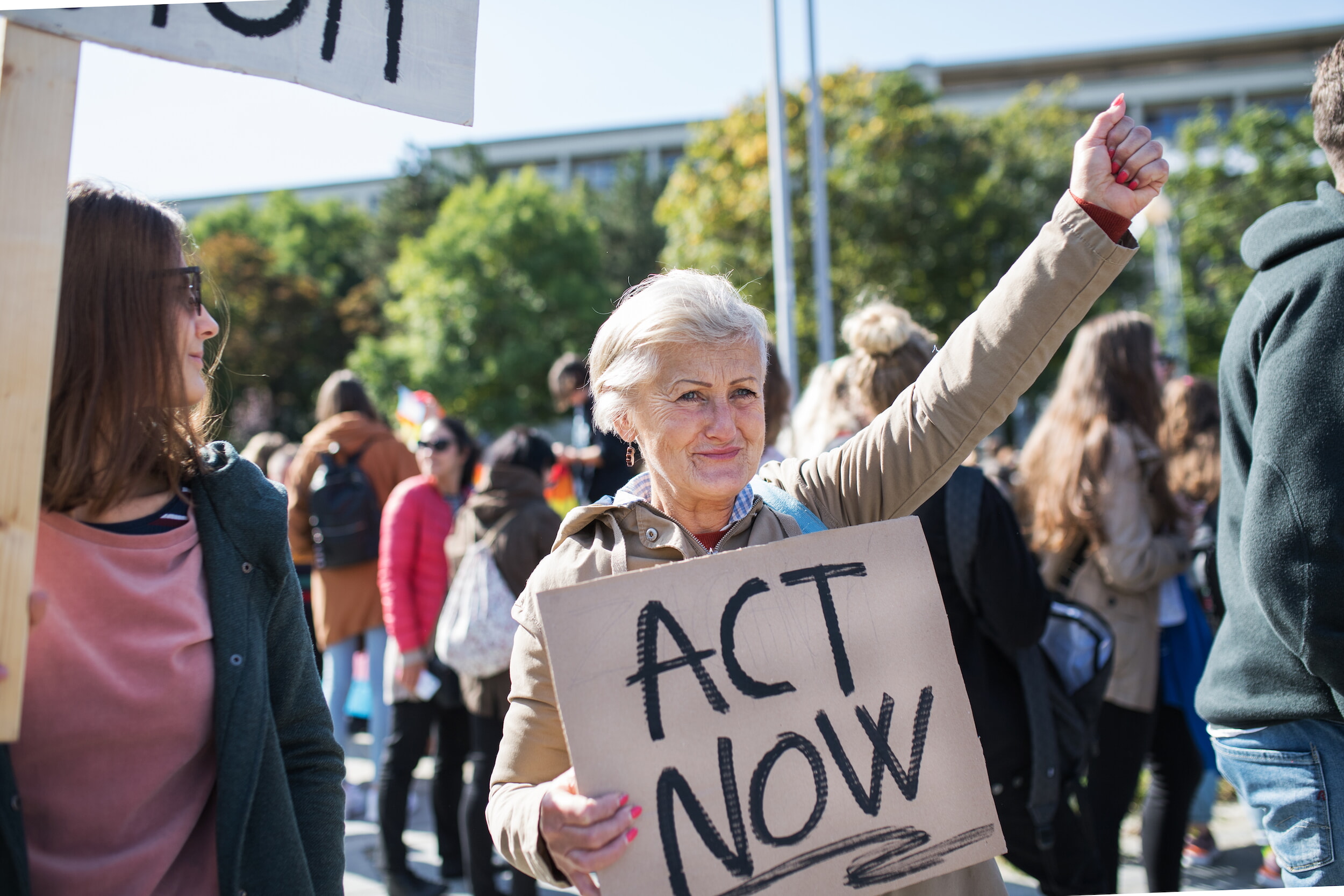 Senior With Placard And Poster On Global Strike For Climate Change.