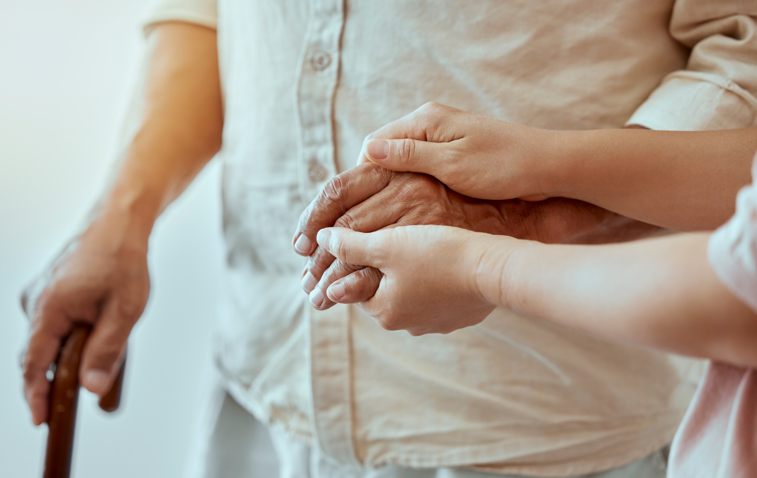 Senior, Child And Hands Holding Together To Show Family Love, Trust And Support To Help Grandparent. Elderly Man With A Helping Young Kid Showing Kindness, Community And Hope For Retirement